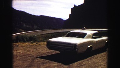 1967: a mountain area is seen traveling by road WYOMING