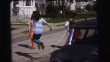1972: girls playing jumping rope on the roads LYNBROOK, NEW YORK