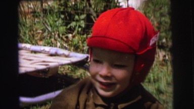 1972: child running and playing in yard LYNBROOK, NEW YORK