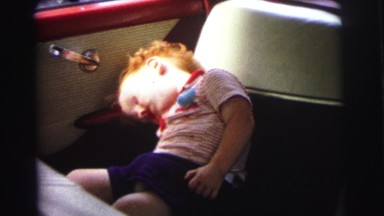 1972: someone watching crazily the boy sleeping in the car seriously LYNBROOK,