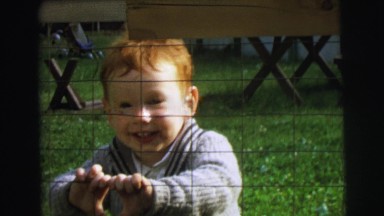 1972: the boy smile makes us happy when he play with beautiful smile LYNBROOK,