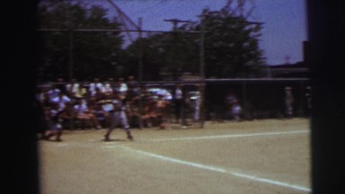 1972: series of pitches at a little league baseball game in a school's ballpark