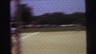 1972: boy hits a fly ball in baseball outfielder catches