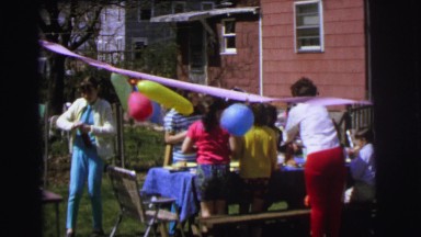 1972: various people and kids enjoying a birthday party outdoors LYNBROOK