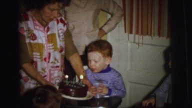 1972: Family Celebrating Birthday with Candles Blown Out in Lynbrook, New York