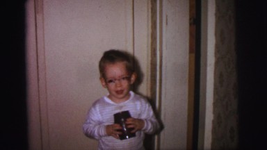 1972: child standing in hallway LYNBROOK, NEW YORK