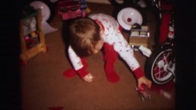 1972: Two Boys in Matching Dresses Playing with Toys in Lynbrook, New York