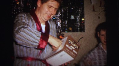 1972: the man playing with the kids LYNBROOK, NEW YORK