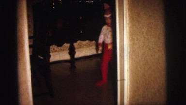 1972: two boys attractively dressed with their mom enter the room LYNBROOK