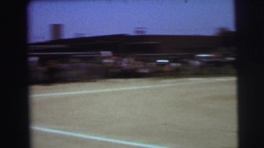 1972: kids playing a good game of baseball at a baseball game. LYNBROOK