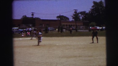 1972: children baseball players made several plays in the infield LYNBROOK