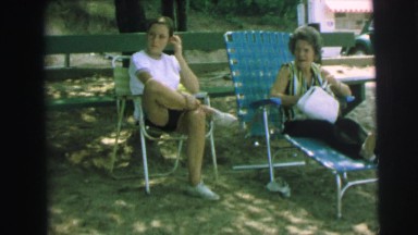 1972: family resting outside LYNBROOK, NEW YORK