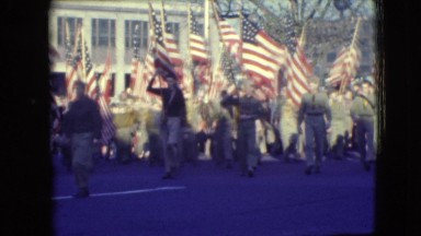 1948: scout troop parades with american flags BALTIMORE, MARYLAND