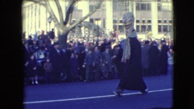 1948: parade with clowns hauling letters and man with funny hat BALTIMORE,