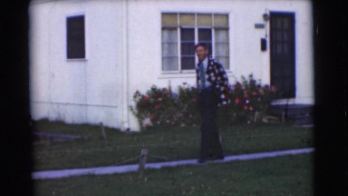 1951: a man in suit is seen walking CHATHAM, NEW JERSEY