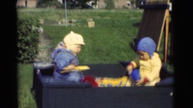 1951: kids wearing cute dresses in the tub playing with bucket and mug CHATHAM,