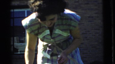 1951: lovely video of a caring mother walking and tickling her small child.