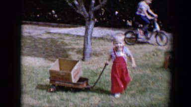 1958: the child that likes carrying packages around through the neighborhood