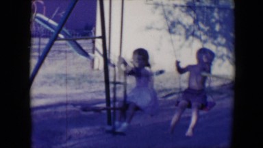 1958: children are seen swinging TUCSON, ARIZONA