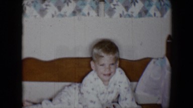 1958: the boy crazily makes something on the bed TUCSON, ARIZONA