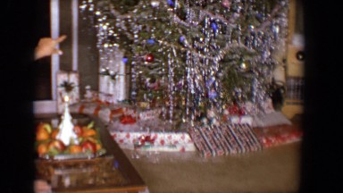 1958: two boys opening presents on christmas morning. TUCSON, ARIZONA