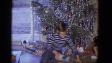 1958: boys opening presents on christmas TUCSON, ARIZONA