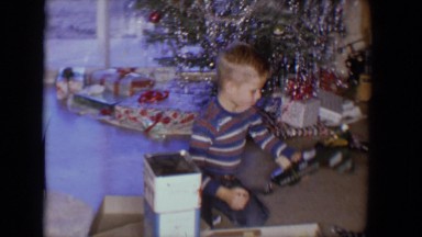 1958: two blonde hair boys playing with toys in the room TUCSON, ARIZONA