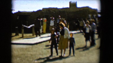 1958: tourists are visiting a historic place with many relics TUCSON, ARIZONA