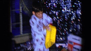 1959: two boys are playing with big toys inside a decorated room DISNEYLAND,