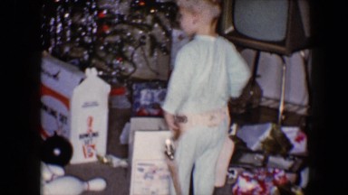 1959: two guns in the side pockets what is he searching?, DISNEYLAND, CALIFORNIA