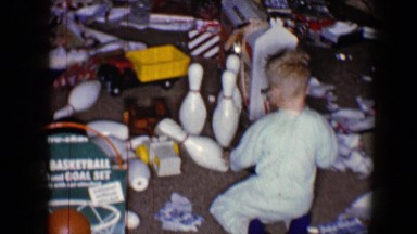 1959: happy brothers playing with toys in living room of house DISNEYLAND,
