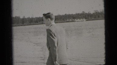 1956: A Man in Suit Walking Through New York City