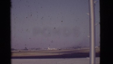 1968: large airplane moving quickly on runway at airport outside COTTONWOOD,