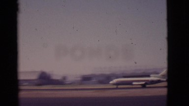 1968: airplane taking off on airport runway in front of buildings COTTONWOOD,