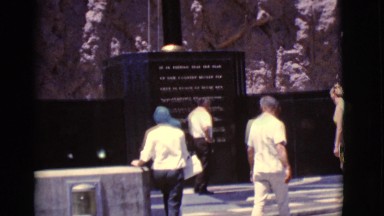 1968: visitors at the center reading the plague for historical information