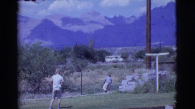 1968: two young children playing with a ball COTTONWOOD, ARIZONA