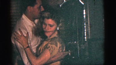 1956: a small band with a guitarist and an accordion player play music