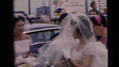 1962: a beautiful bride in a traditional white wedding dress