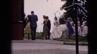 1962: bride arrives accompanied by her bridesmaids to the ceremony venue