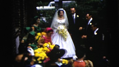 1962: a beautiful bride is getting ready to throw her bouquet out