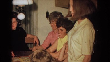 1967: a happy get together of family members at a table with activities NEVADA