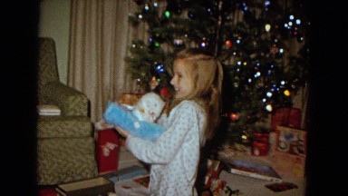 1967: two girls smiling during their opening of gifts NEVADA