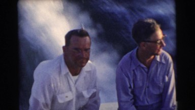 1956: middle-age men cruise the ocean in a speedboat and create ripples
