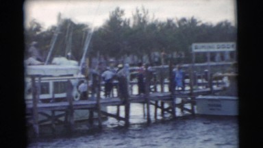 1956: sailing past a dock FLORIDA