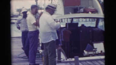 1956: people are seen standing beside a car FLORIDA