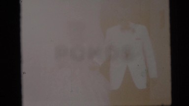 1967: bride and groom get into a car after exiting a church CAMDEN, NEW JERSEY