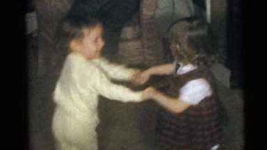 1956: children are seen indoors playing FLORIDA