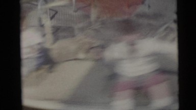 1967: children spin on merry-go-round very quickly; one falls off CAMDEN
