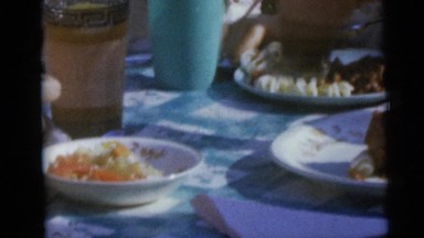 1967: barbeque with family in the backyard eating and drinking delicious food