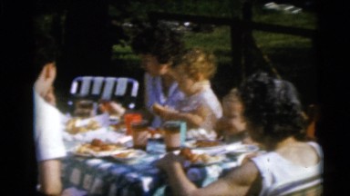 1967: a family eating a meal together CAMDEN, NEW JERSEY